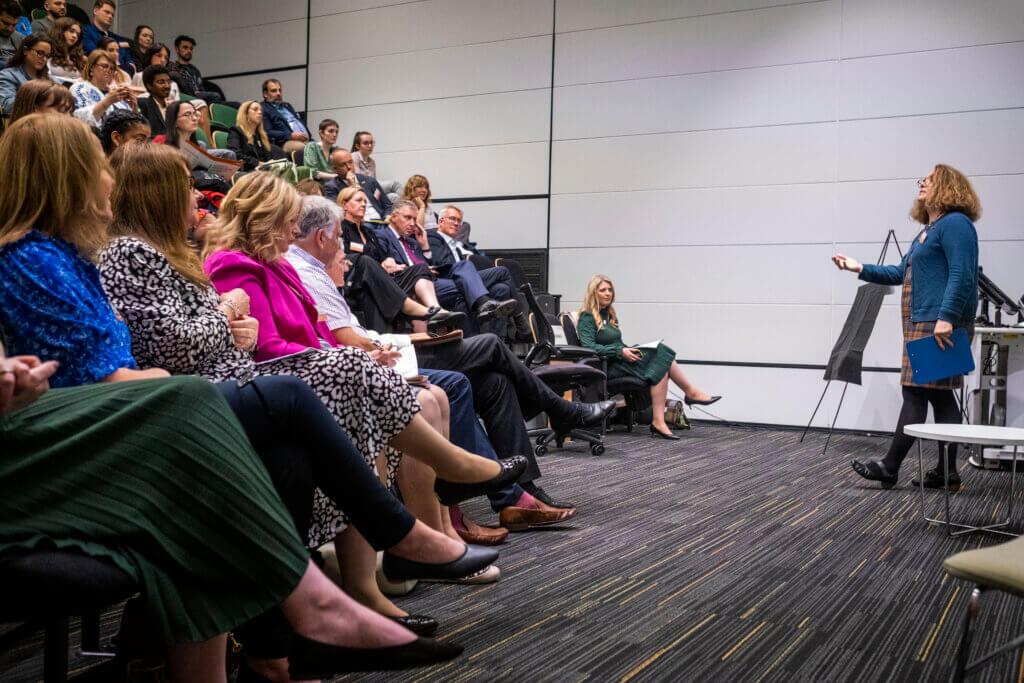 Gyll Curtis Machin presenting to a room